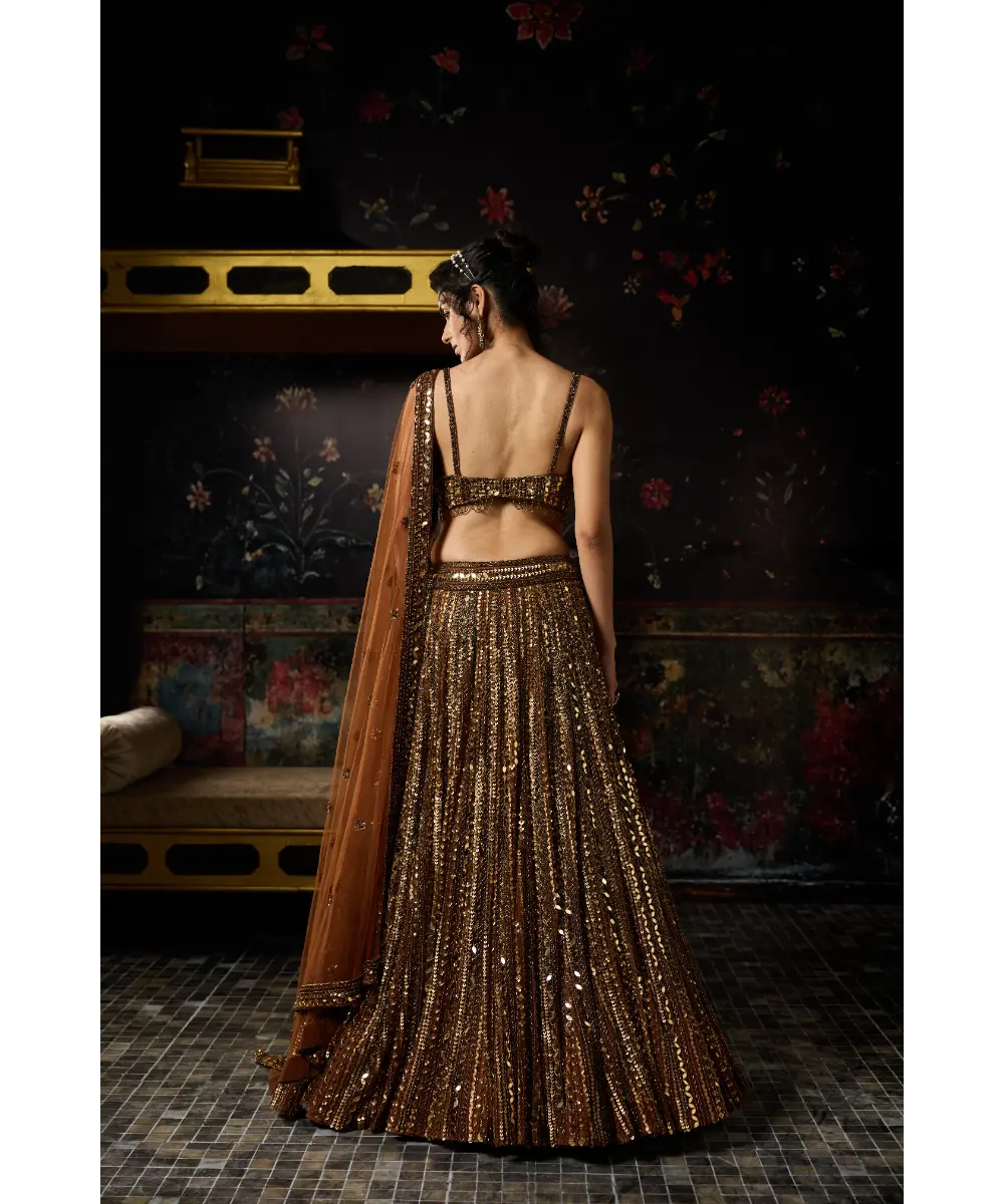DIYARAJVVIR - METALLIC GOLD EMBELLISHED MIRRORWORK LEHENGA SET